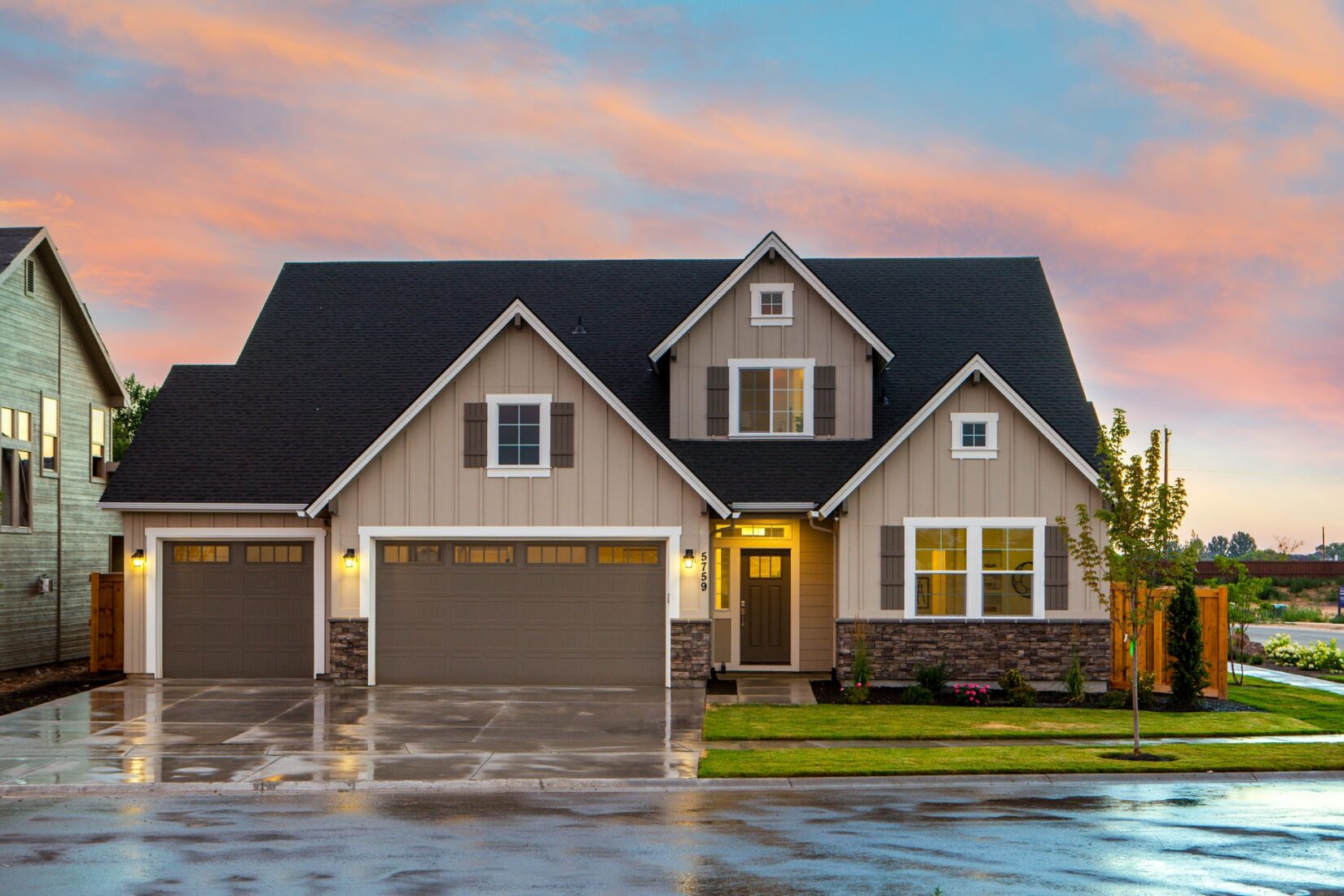 Brown painted house with black roof