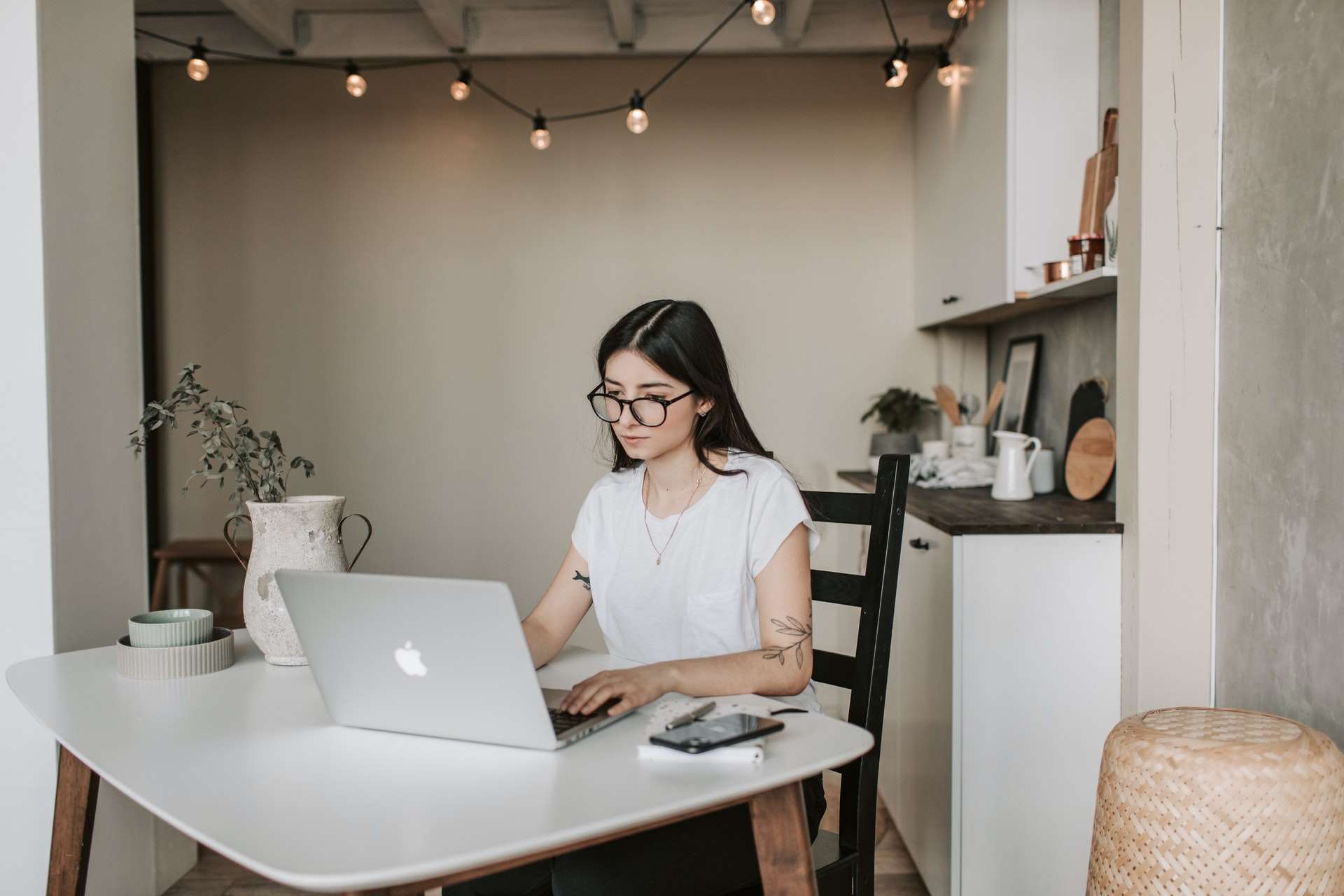 Woman using a laptop at home