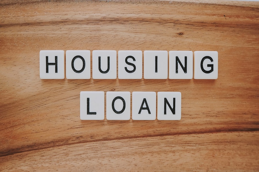 Letter block arranged to spell housing loan