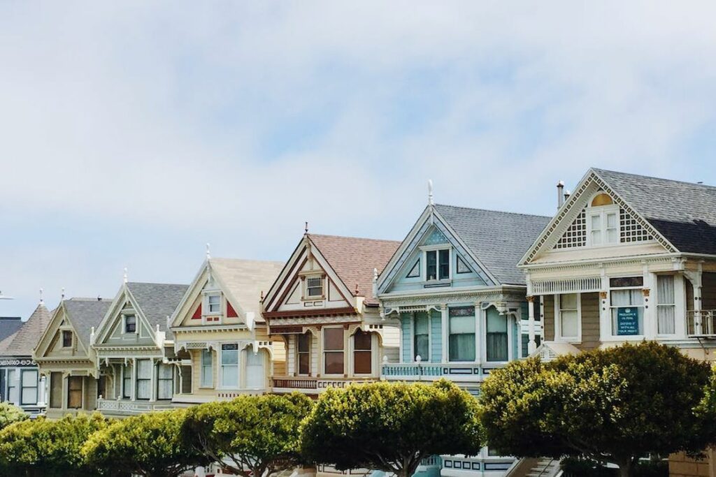 Multi colored houses lined up in a row